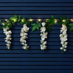 Solar Powered 180cm Artificial Leaf Garland With Wisteria Flowers - Warm White 6 Solar Powered 180cm Artificial Leaf Garland With Wisteria Flowers - Warm White -Garden Supply Store 379258 180cm solar powered artificial leaf garland with wisteria flowers 20 warm white micro leds 3